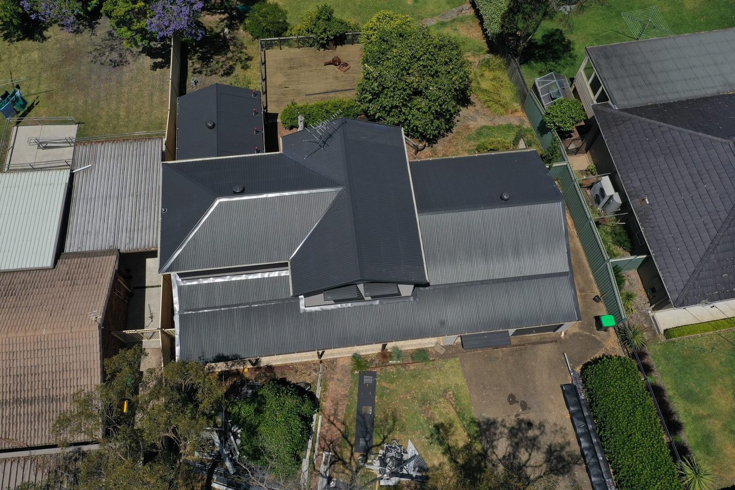 Aerial view of a dark metal roof on a house